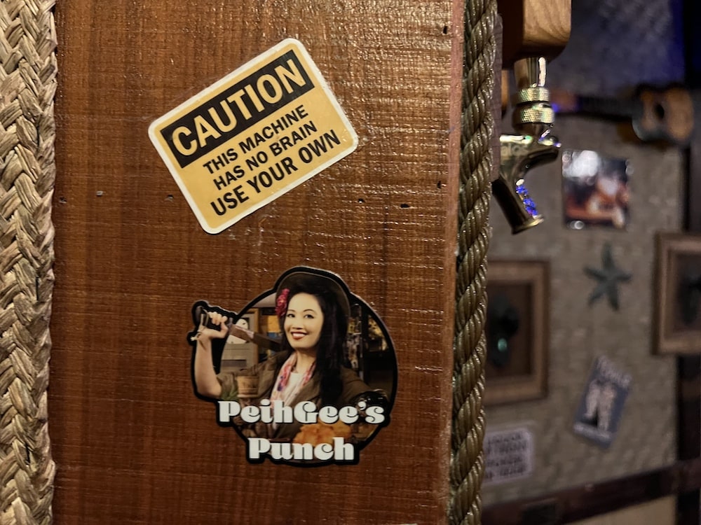 A sticker featuring Peih-Gee Law of Survivor and Reality Escape Pod fame, dressed as a pirate. Text reads, "PeihGee's Punch."