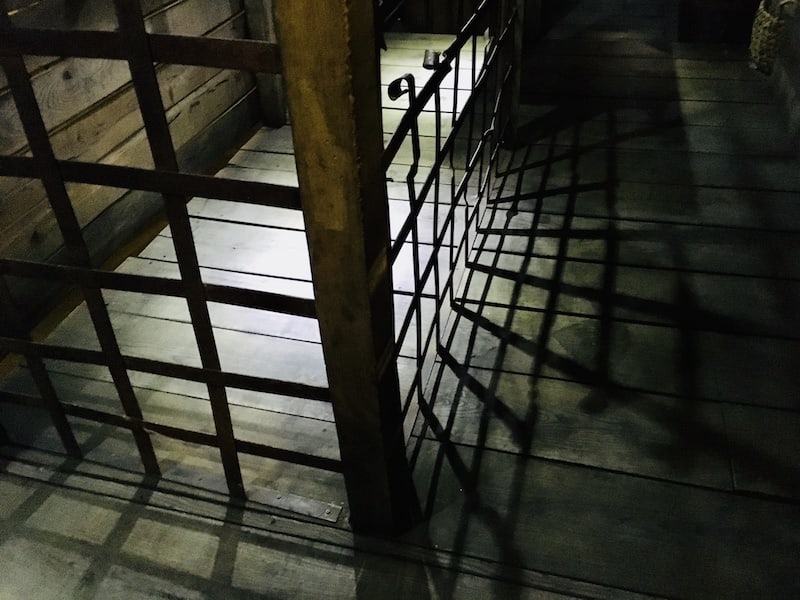 In-game: A caged area inside of an old ship.