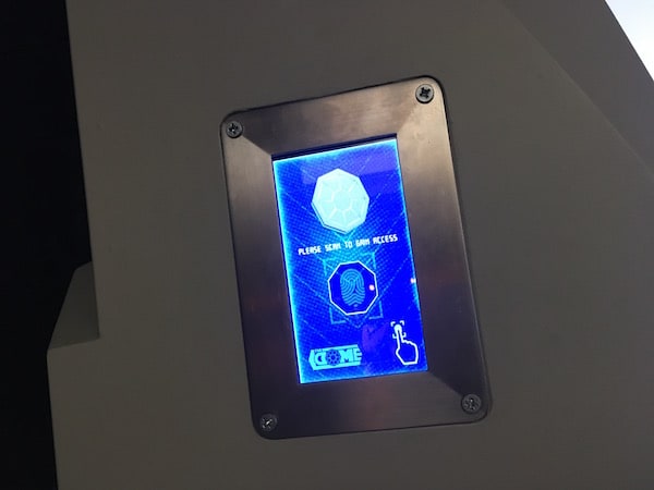 In-game: A fingerprint scanner mounted to the wall.