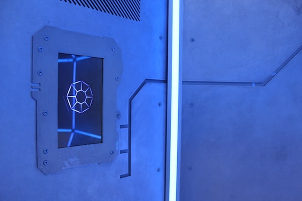 In-game: A screen mounted into the steel wall of The Dome.