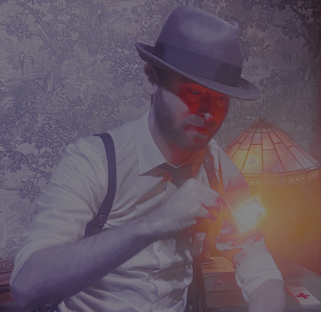 M man wearing a fedora and suspenders with a button down shirt show is looking at a gadget filled with light.