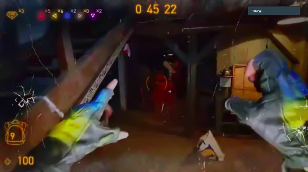 First person view of an old building, the avatar's hands are visible along with various HUD indicators.