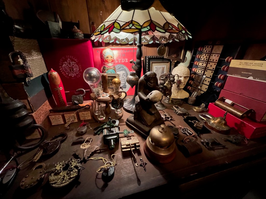 collection of antique brass locks and other objects d'art