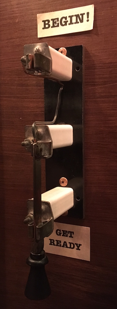 A big, old switch. It is set to "Get Ready" and the other position is "Begin!"