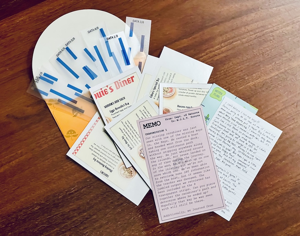 A open transmission envelope revealing an assortment of puzzle components.
