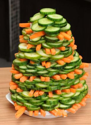 tower built from cucmbers and carrot sticks