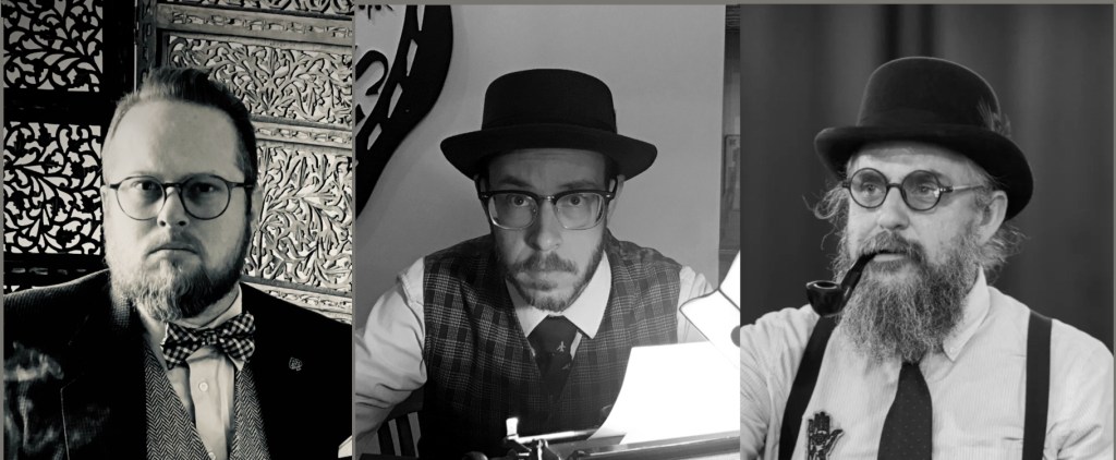black and white photo of Three men dressed in antique looking clothing. Leftmost man is wearing glasses with his hair slicked back, serious expression on his face. he's wearing a blazer, herrinbone vest and plaid bowtie. Middle man is wearing a porkpie hat, glasses, plaid vest with a tie. rightmost man is wearing a bowler hat, round spectacles, long beard with a pipe. he is wearing a white button down shirt with a tie and suspenders.