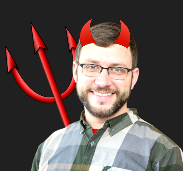 man with glasses and beard in a plaid button down shirt. He has cartoon devil's horns and a pitchfork
