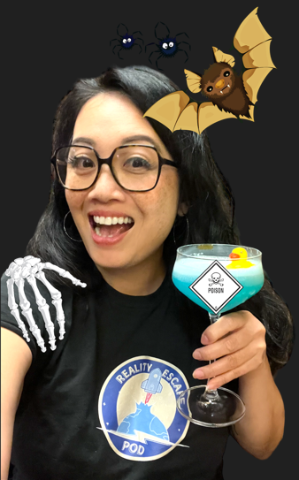 asian woman with glasses holding a blue drink that says poison. there is a skeleton hand on her shoulder and a cartoon bat on her head