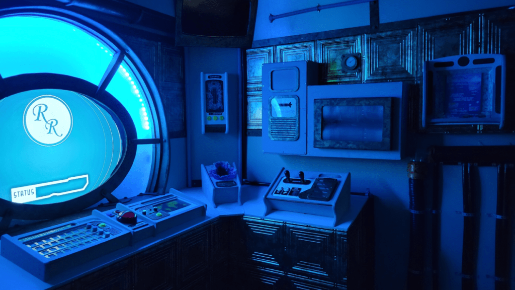 underwater command center filled with blue light