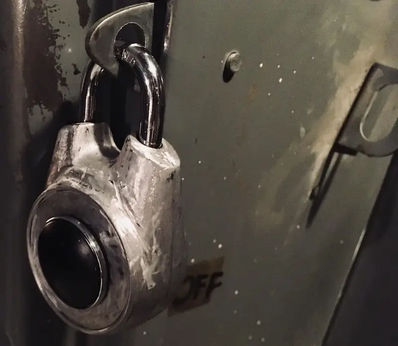 directional lock which has been stripped of its paint